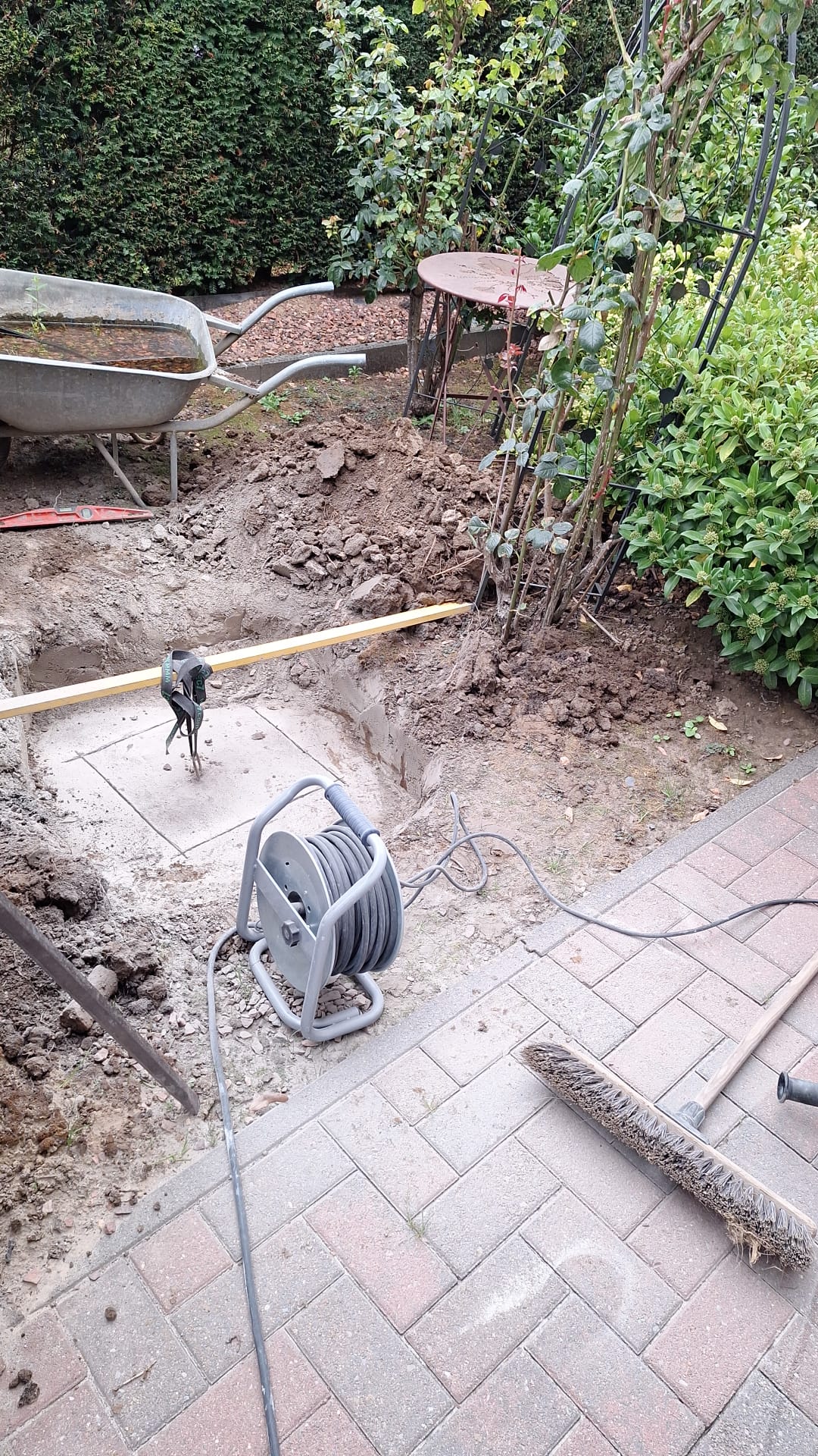 Ophogen regenwaterputten Schoonbeek